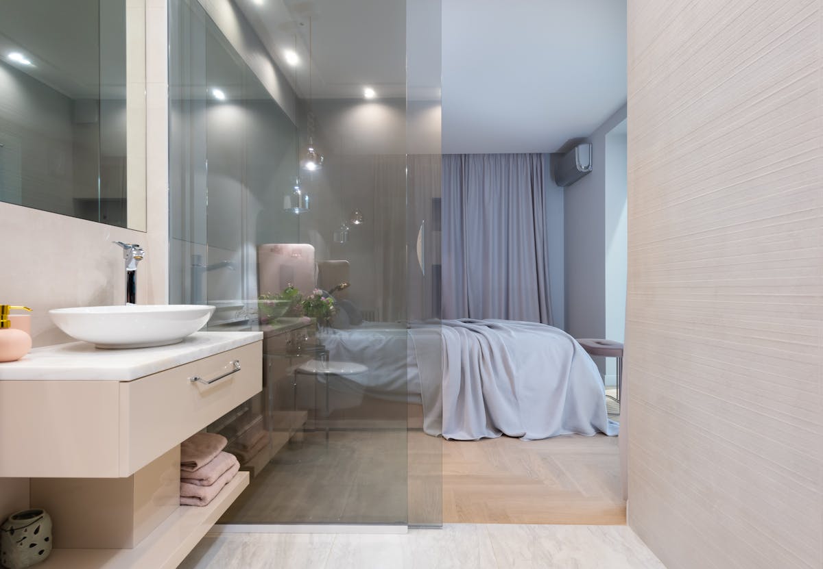 Ensuite renovation Camberwell: modern walk-in shower with frameless screen and wall-hung vanity